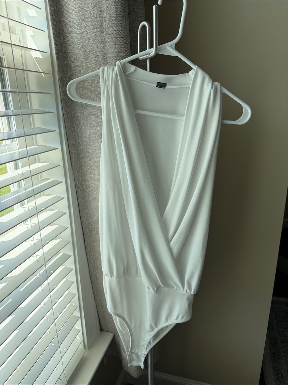 SHEIN White Sleeveless Surplice Bodysuit